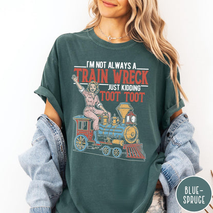 Comfort Colors tee in Blue Spruce featuring vintage style pin-up woman sitting on a steam train graphic