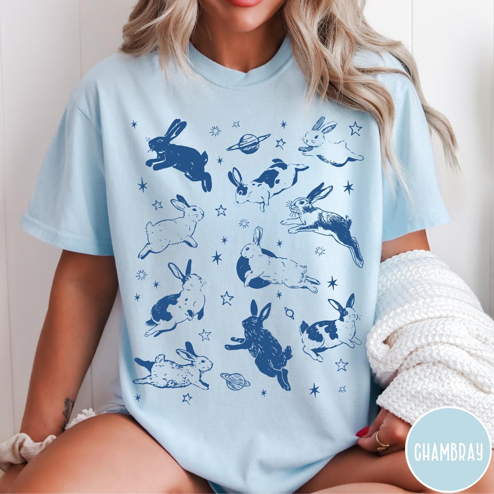 Comfort Colors tee in Chambray featuring celestial design style with jumping bunnies and planets graphic print