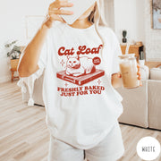 Comfort Colors tee in White featuring graphic style cat loaf sitting on a wooden cutting board