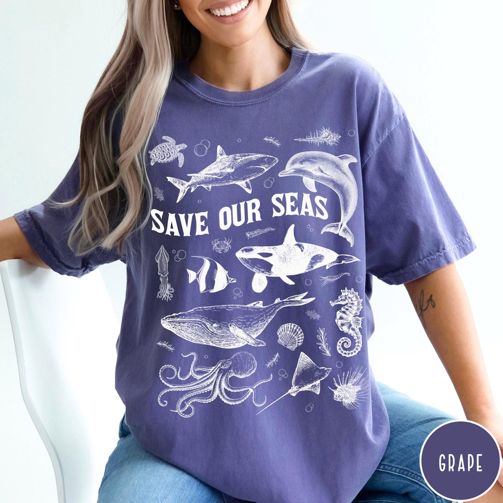 Comfort Colors tee in Grape featuring line art marine life graphic with Save Our Seas text design