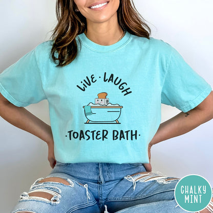 Comfort Colors tee in Chalky Mint featuring cute graphic style of a smiling toaster sitting in a bathtub