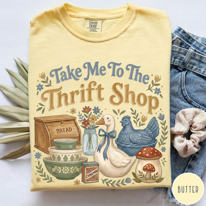 Comfort Colors tee in Butter featuring vintage kitchenware graphic with a duck, bread box, and mushrooms.