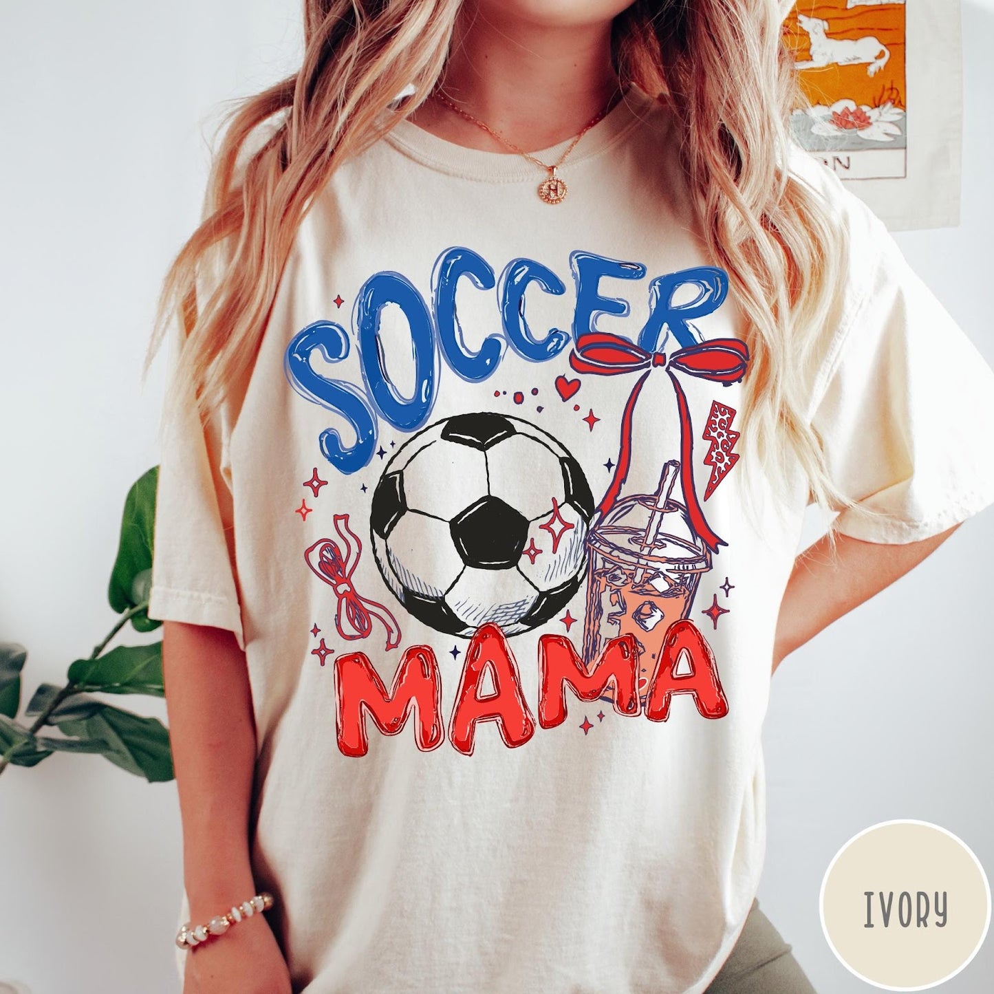 Comfort Colors tee in Ivory featuring soccer graphic with a soccer ball, iced coffee, and red bow