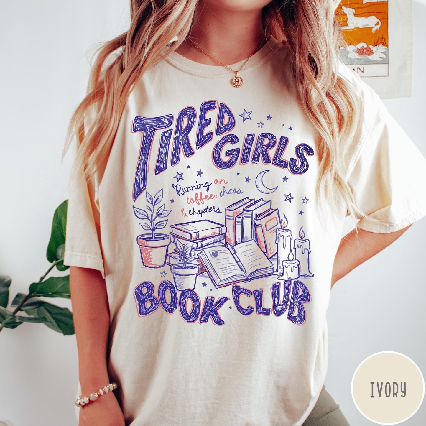 Comfort Colors tee in Ivory featuring book club design with stacks of books, plants, and candles.