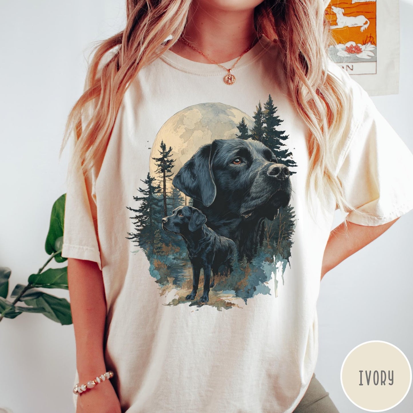 Comfort Colors tee in Ivory featuring nature style graphic of black Labrador dogs in a forest moon scene