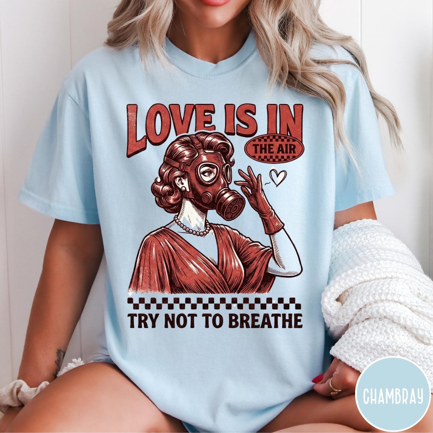 Comfort Colors tee in Chambray featuring retro graphic design of a woman wearing a gas mask