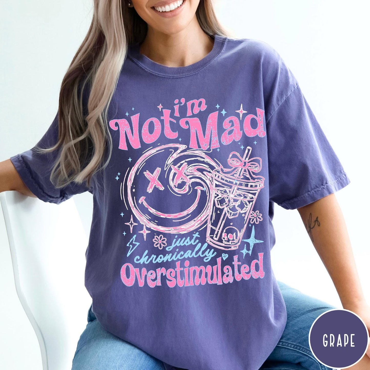 Comfort Colors tee in Grape featuring retro style graphic with smiley face and iced coffee cup design