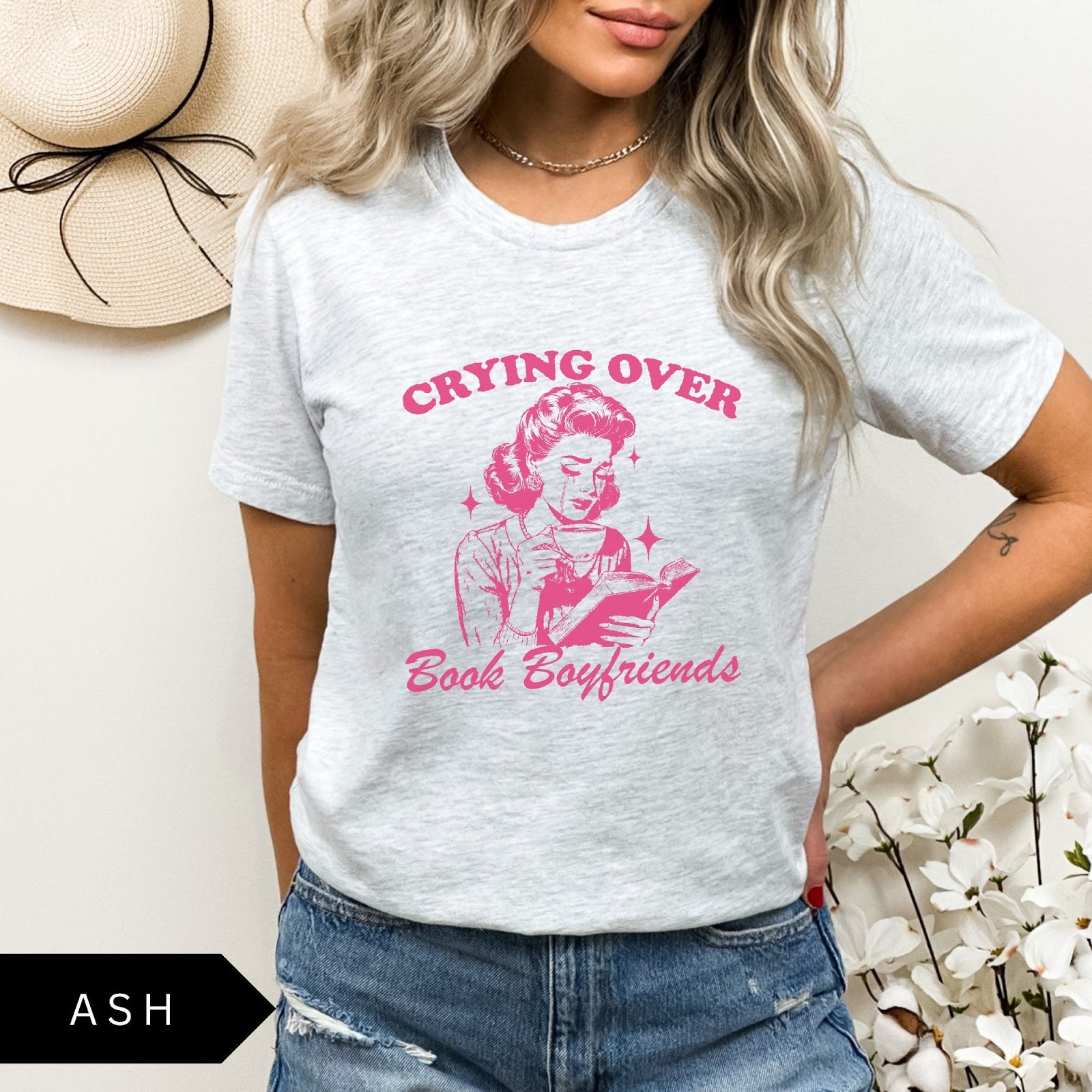 Comfort Colors tee in Ash featuring retro style graphic of a woman crying while reading a book