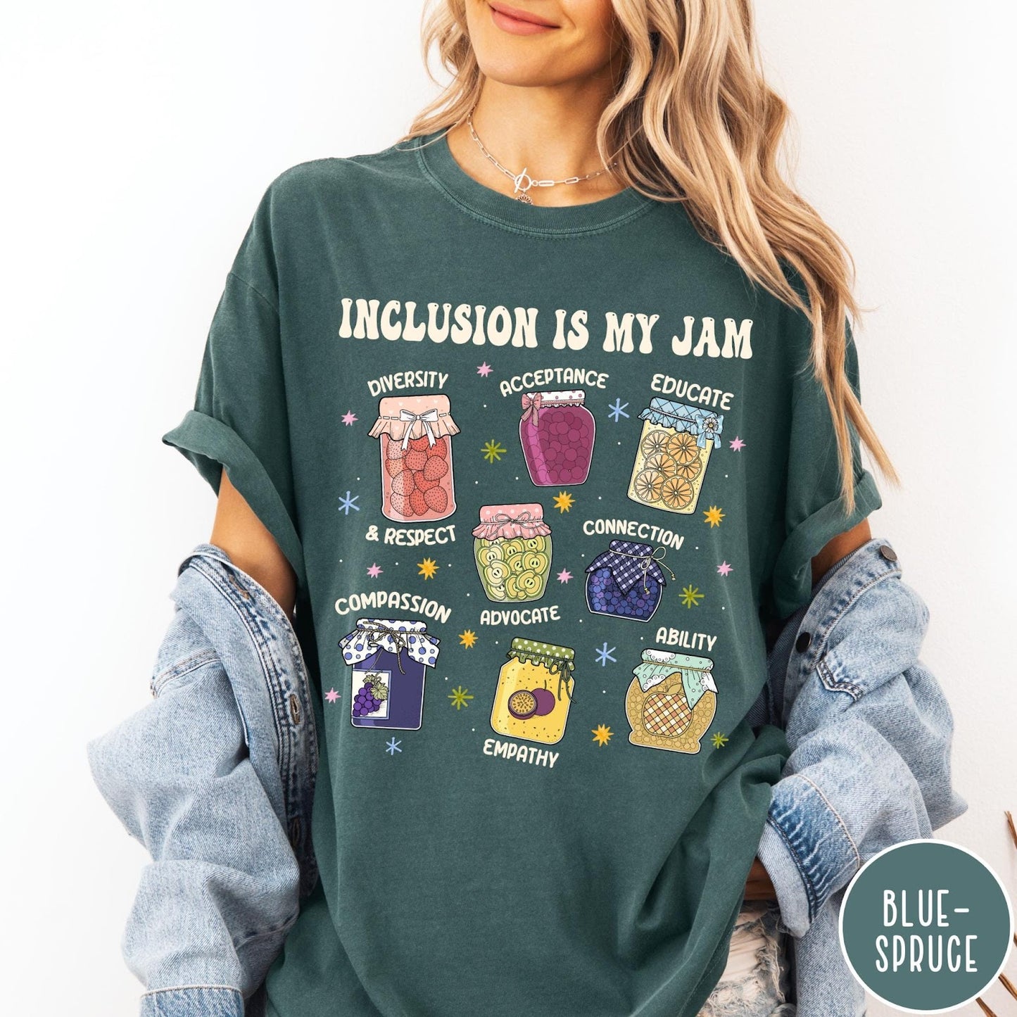 Comfort Colors tee in Blue Spruce featuring retro style graphic with jam jars labeled with inclusion and advocacy terms