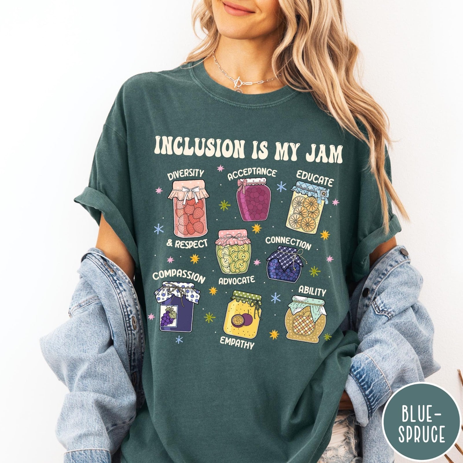 Comfort Colors tee in Blue Spruce featuring retro style graphic with jam jars labeled with inclusion and advocacy terms