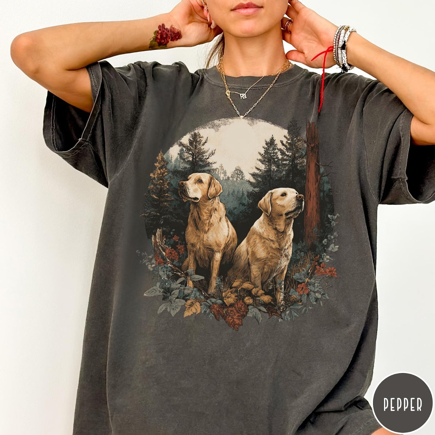 Comfort Colors tee in Pepper featuring vintage style graphic of two golden labrador dogs in a forest