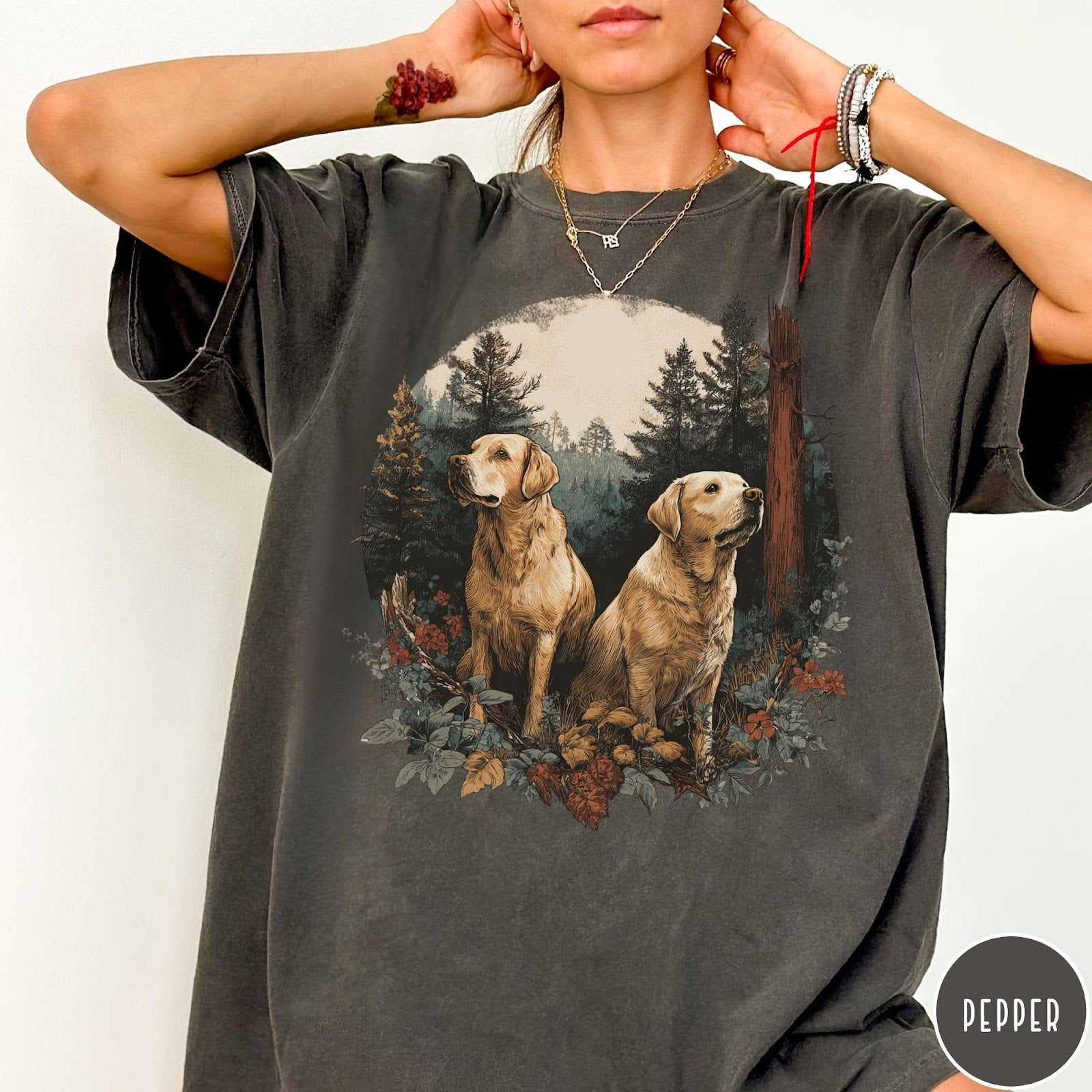 Comfort Colors tee in Pepper featuring vintage style graphic of two golden labrador dogs in a forest
