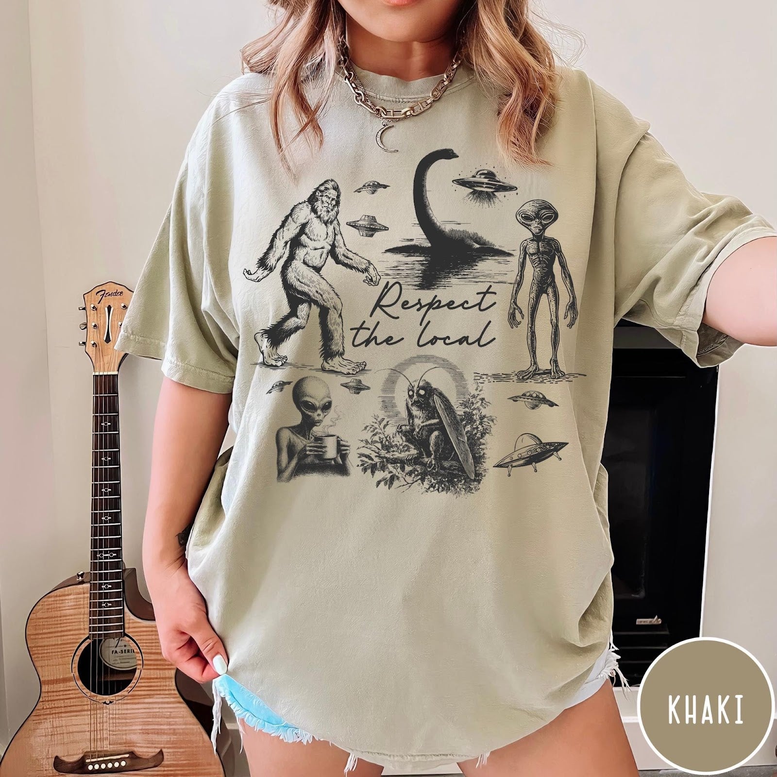 Comfort Colors tee in Khaki featuring vintage style graphic of Bigfoot, Loch Ness Monster, aliens, and UFOs