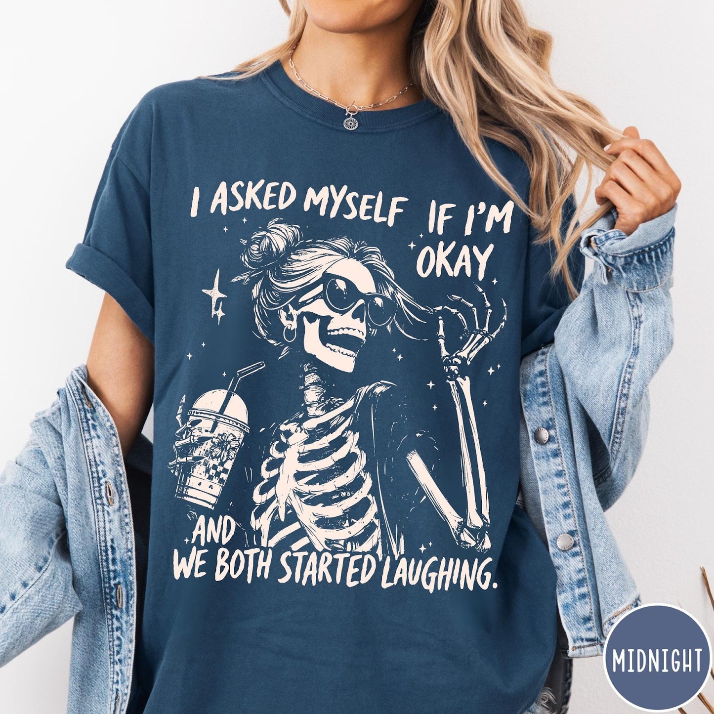 Comfort Colors tee in Midnight featuring skeleton design with sunglasses and iced coffee with laughing text graphic
