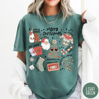 Comfort Colors tee in Light Green featuring retro holiday graphic with Santa, Christmas tree, and festive icons