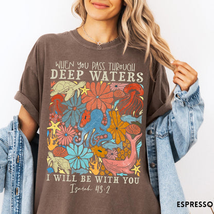 Comfort Colors tee in Espresso featuring artistic marine life graphic with Isaiah 43:2 Bible verse text
