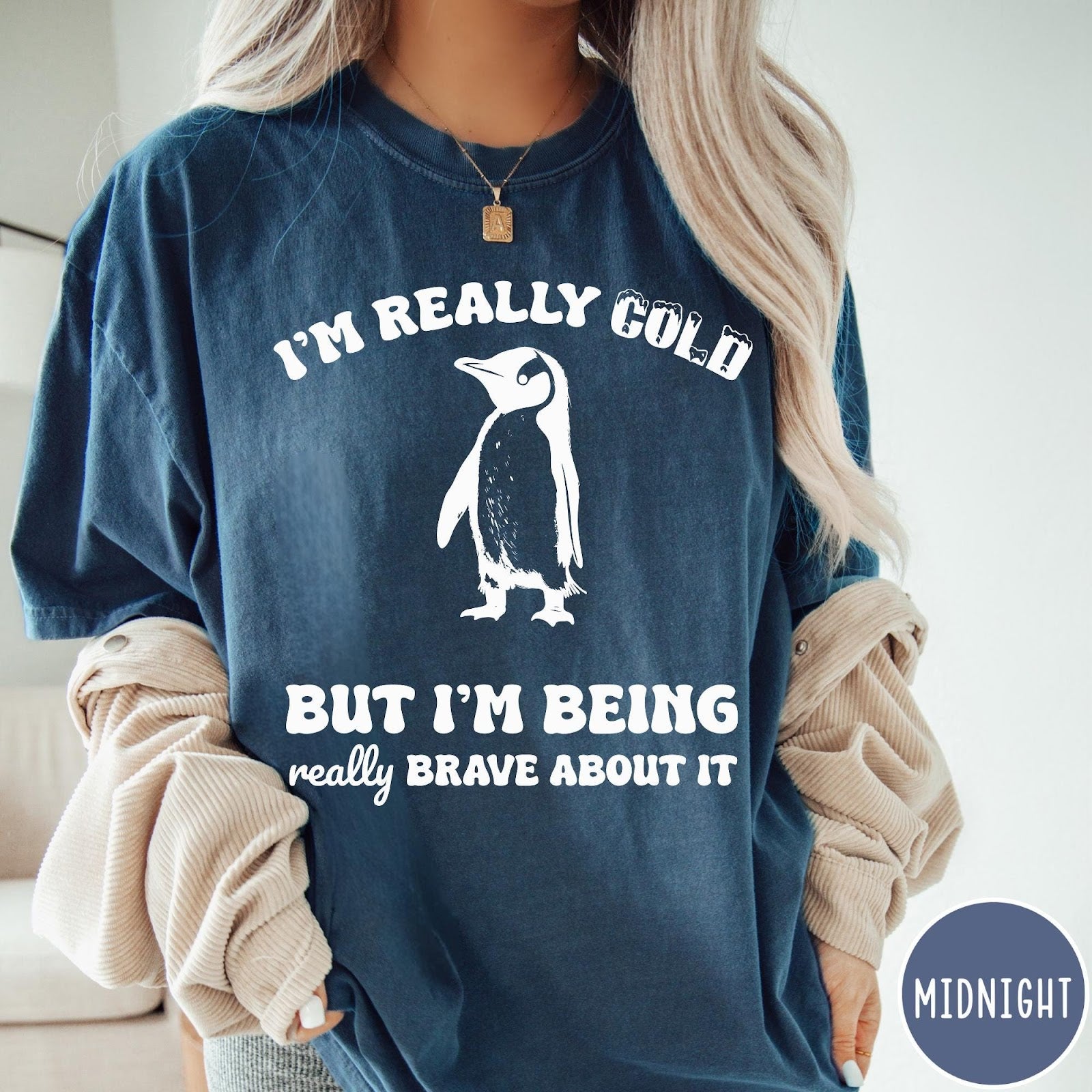 Comfort Colors tee in Midnight featuring penguin graphic with text I am really cold but I am brave