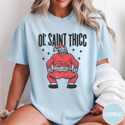 Comfort Colors tee in Chambray featuring festive graphic style Santa Claus doing a dance move with stars