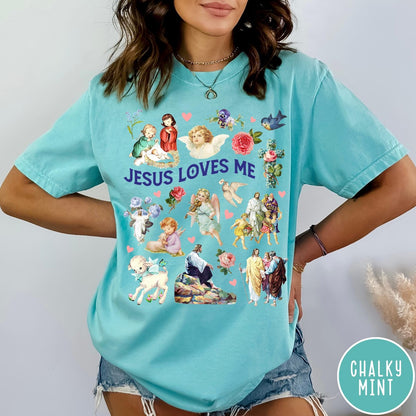 Comfort Colors tee in Chalky Mint featuring vintage religious style graphic with Jesus, angels, lambs, and floral elements