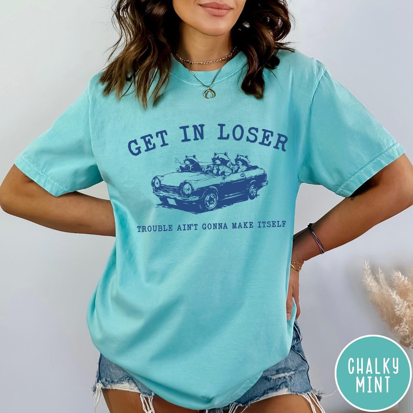 Comfort Colors tee in Chalky Mint featuring vintage style graphic of three raccoons driving a convertible car