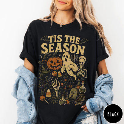 Comfort Colors tee in Black featuring vintage style Halloween icons collage with pumpkin, ghost, skeleton, and potions
