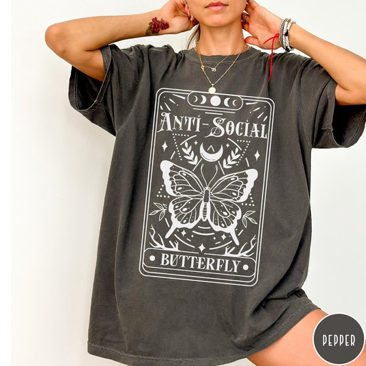 Comfort Colors tee in Pepper featuring tarot card style graphic with butterfly and celestial moon phase design