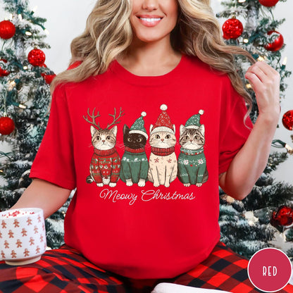 Comfort Colors tee in Red featuring holiday graphic of four cats wearing Christmas sweaters and hats
