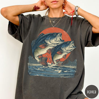 Comfort Colors tee in Pepper featuring vintage style graphic of two bass fish jumping from water