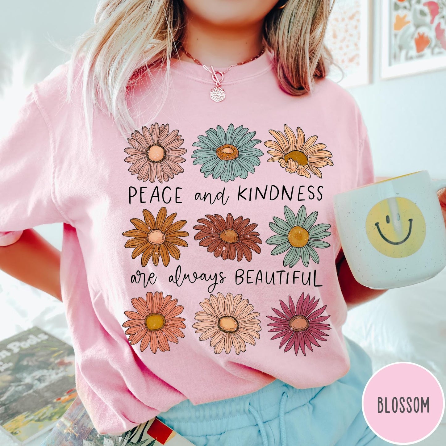 Comfort Colors tee in Blossom featuring floral design with Peace and Kindness are always beautiful text graphic