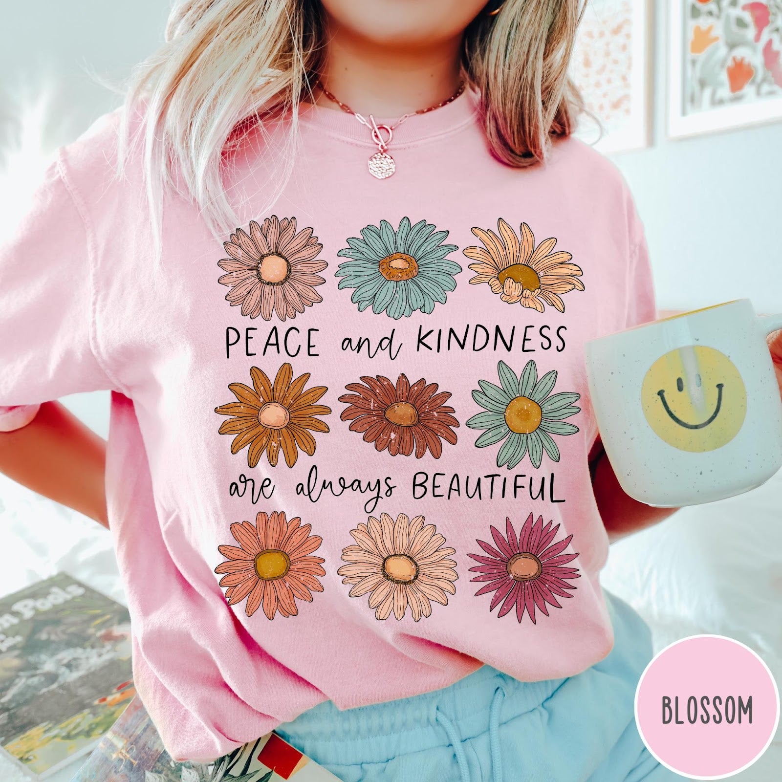 Comfort Colors tee in Blossom featuring floral design with Peace and Kindness are always beautiful text graphic