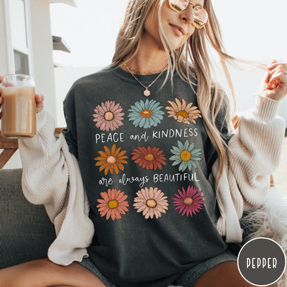 Comfort Colors tee in Pepper featuring floral style graphic with daisies and text Peace and Kindness are always beautiful