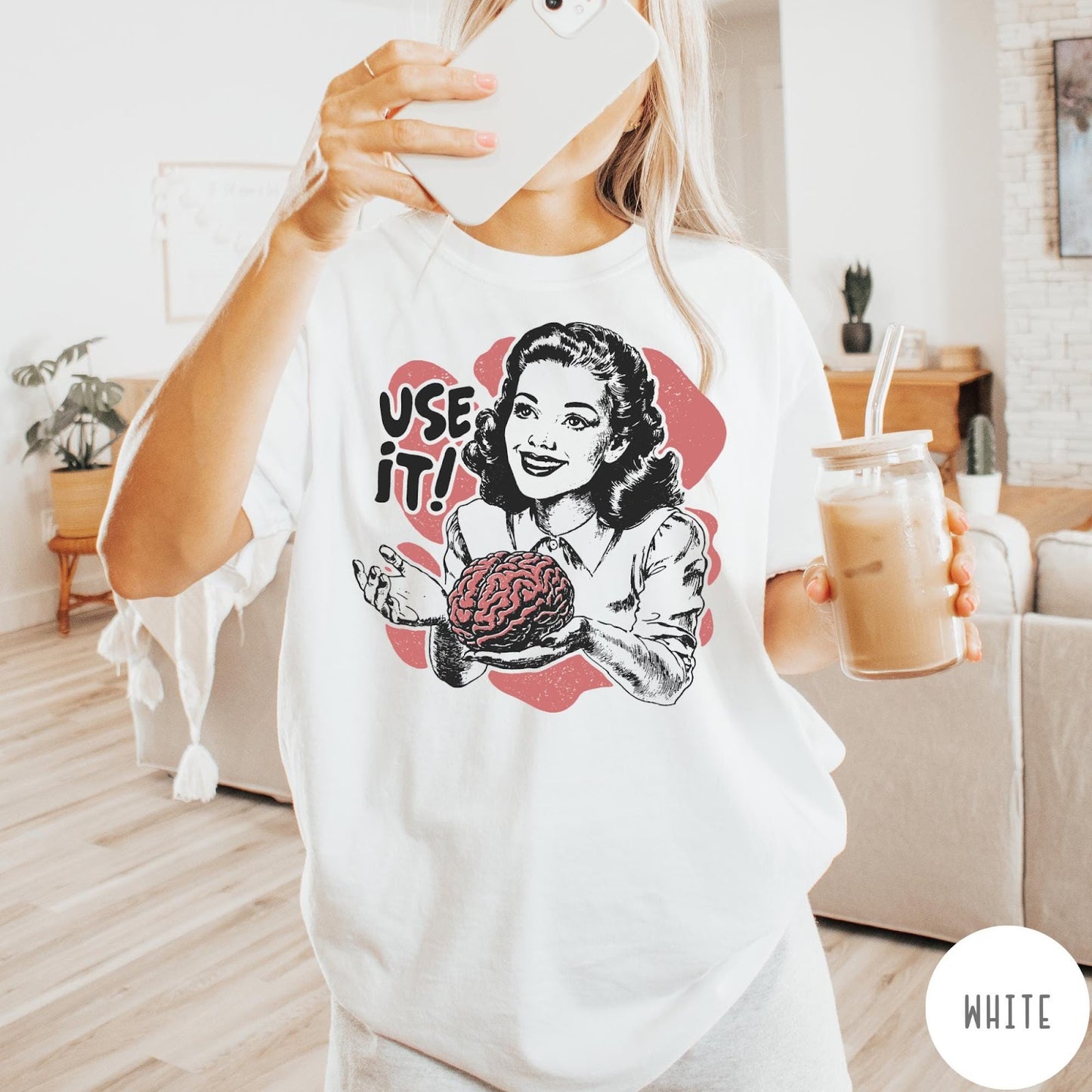 Comfort Colors tee in White featuring retro design of a woman holding a brain with text Use It