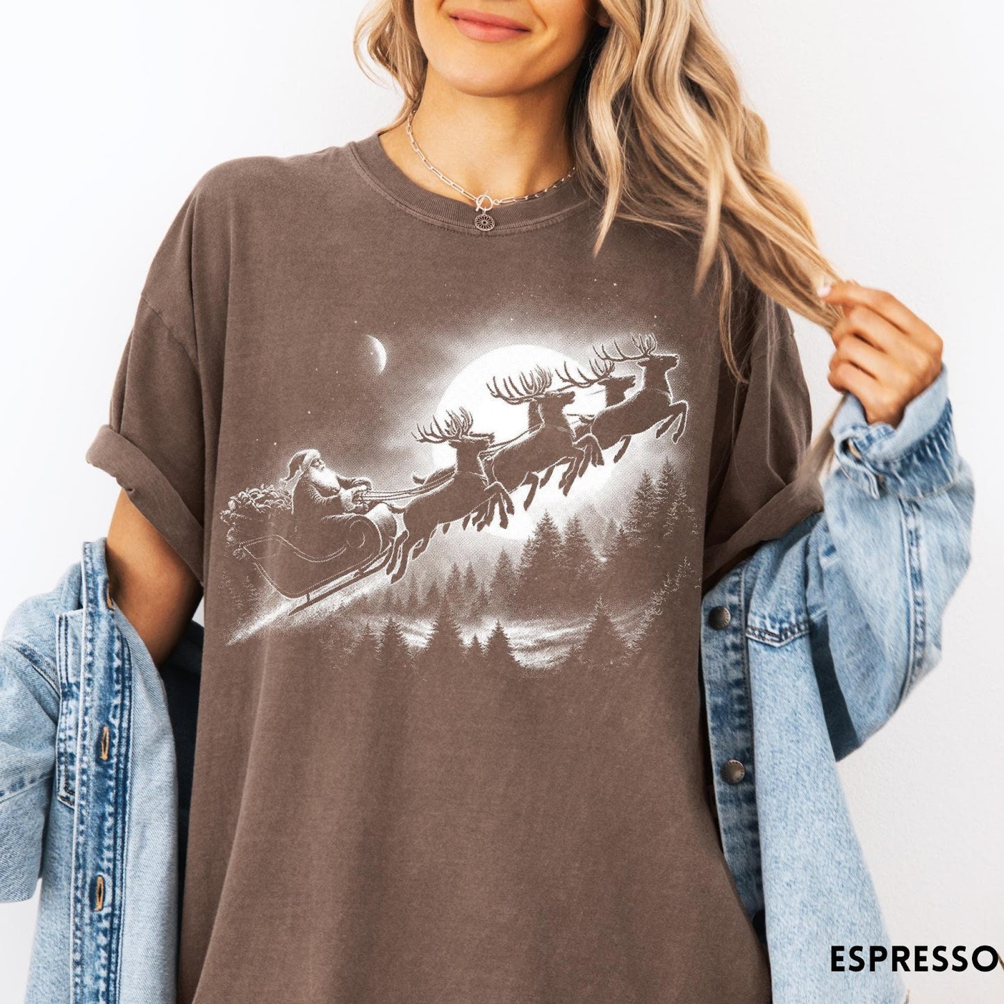 Comfort Colors tee in Espresso featuring vintage style Santa Claus flying in a sleigh with reindeer