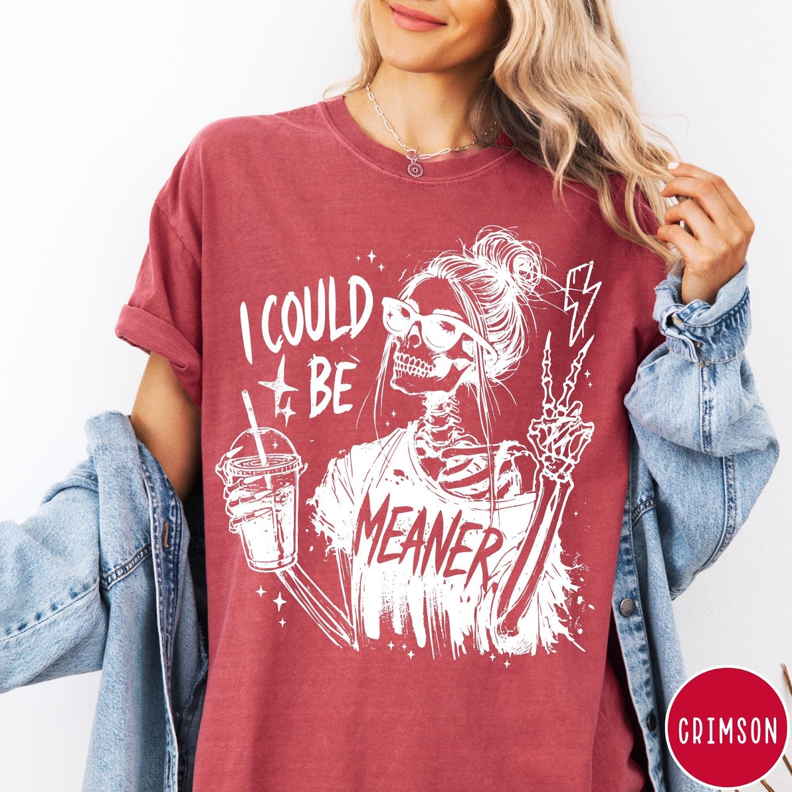 Comfort Colors tee in Crimson featuring skeleton graphic with sunglasses holding a drink and making peace sign