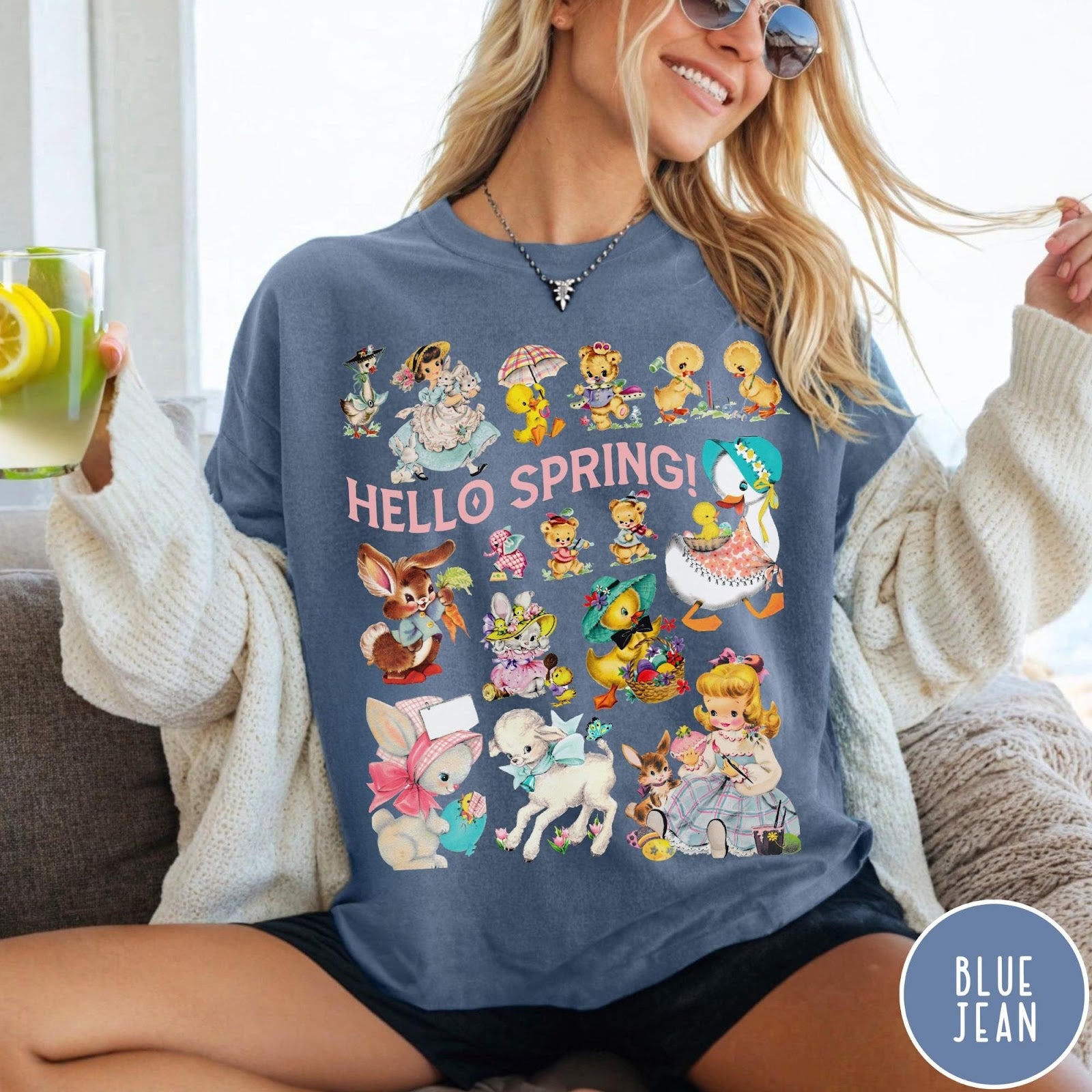 Comfort Colors tee in Blue Jean featuring vintage style graphic with spring animals and children illustrations