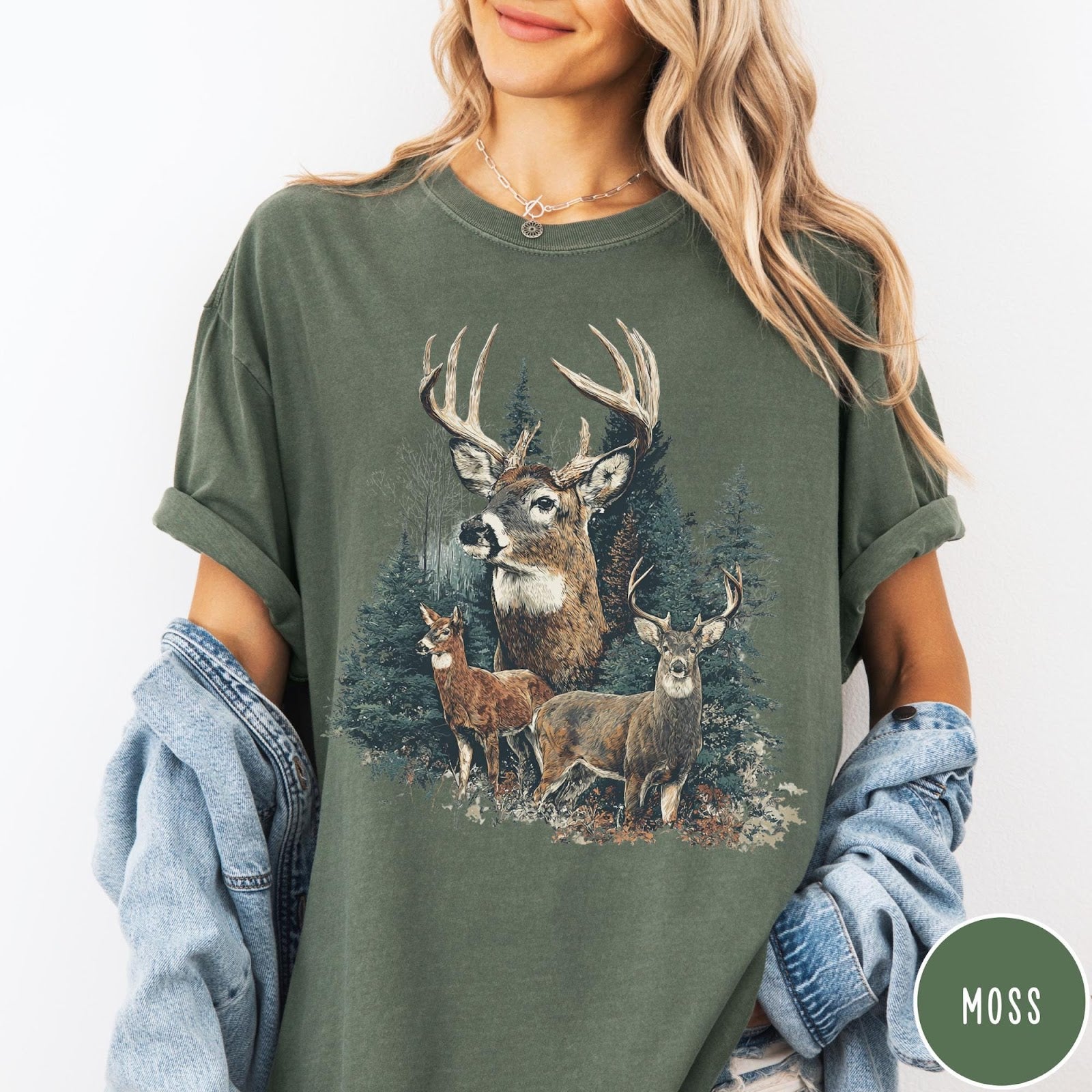 Comfort Colors tee in Moss featuring vintage style graphic of a deer family in a forest scene