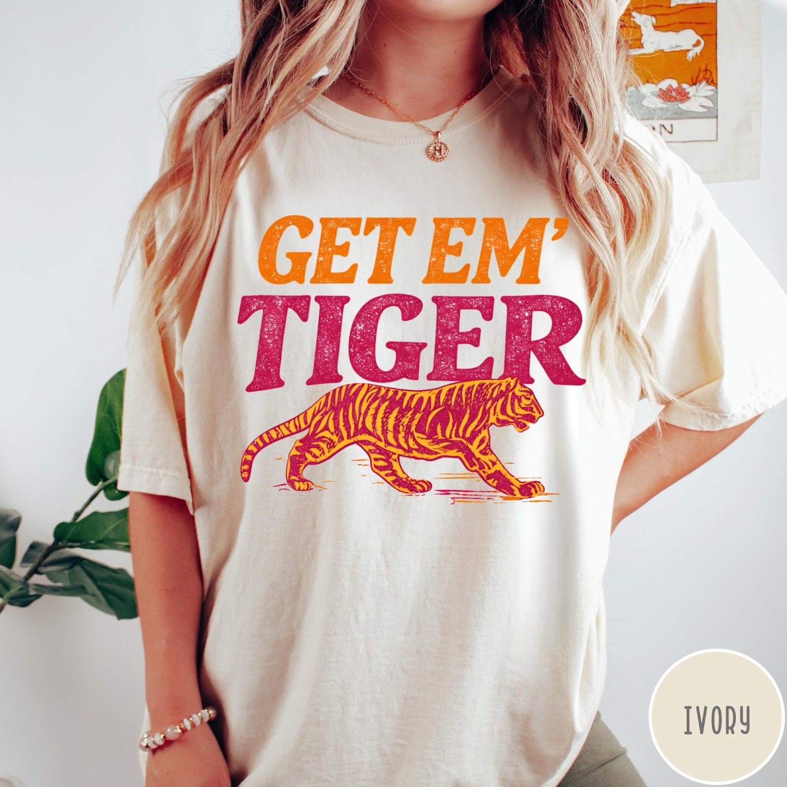 Comfort Colors tee in Ivory featuring vintage style graphic with orange text and a walking tiger illustration