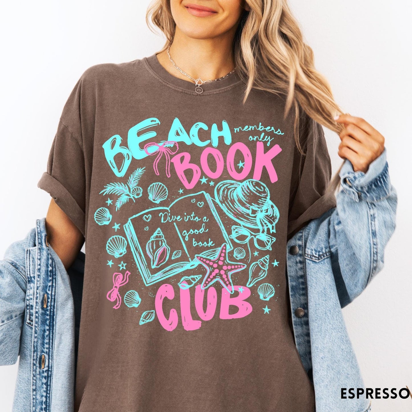 Comfort Colors tee in Espresso featuring beach book club graphic with open book, shells, and hat