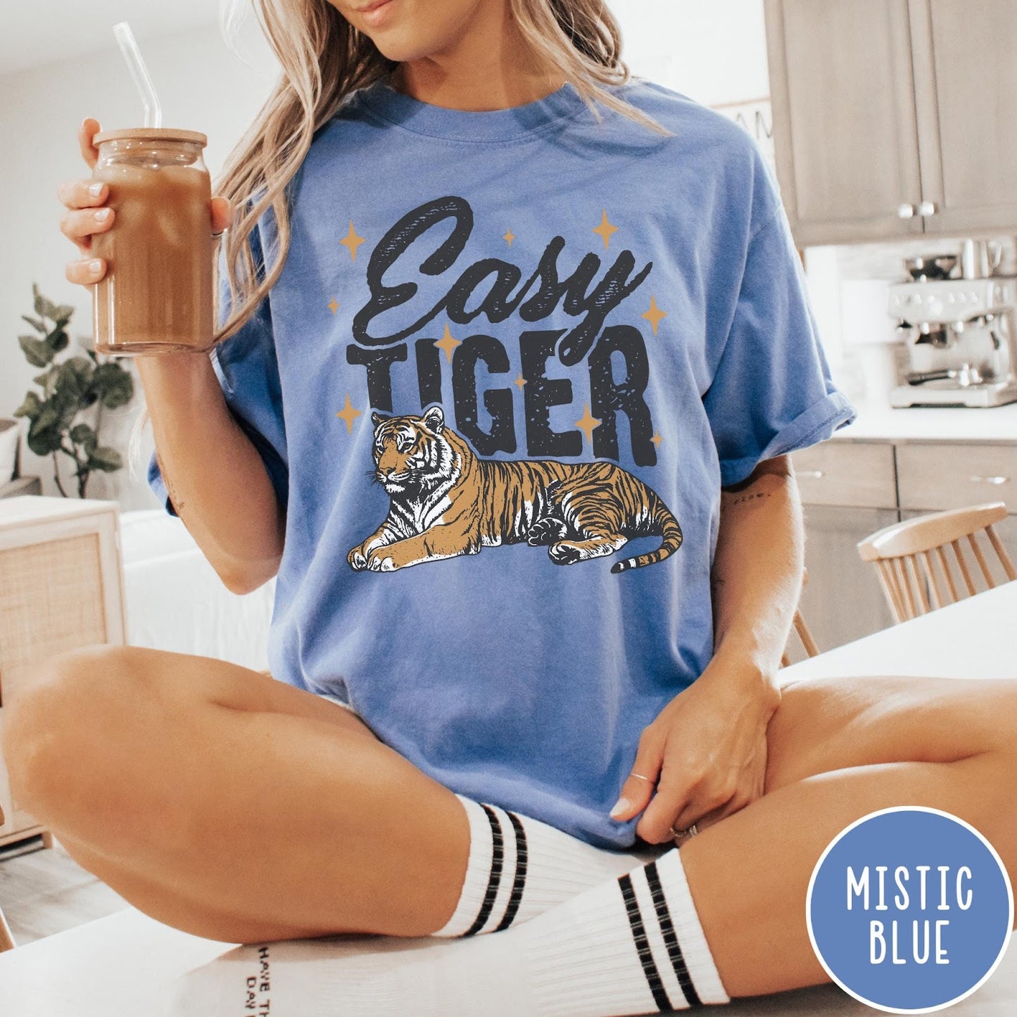 Comfort Colors tee in Mistic Blue featuring vintage style graphic of a tiger with Easy Tiger text