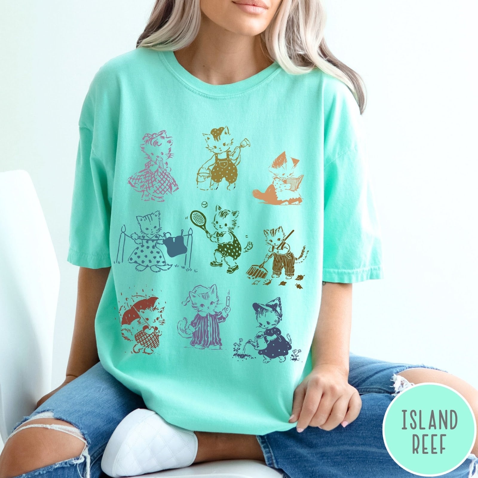 Comfort Colors tee in Island Reef featuring vintage retro style graphic of nine kittens doing various daily activities