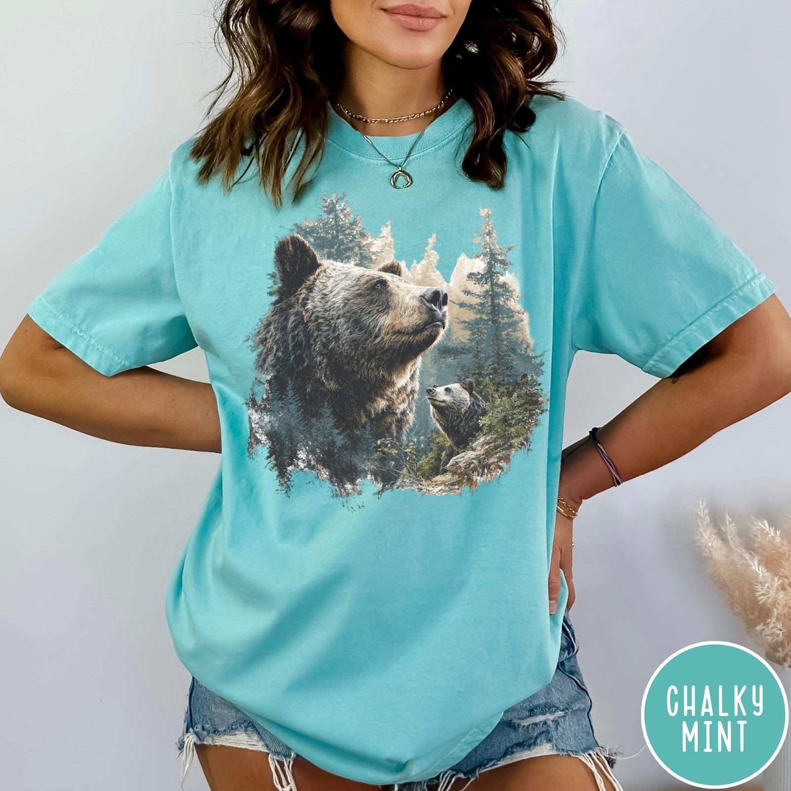 Comfort Colors tee in Chalky Mint featuring vintage nature graphic with two bears in a forest