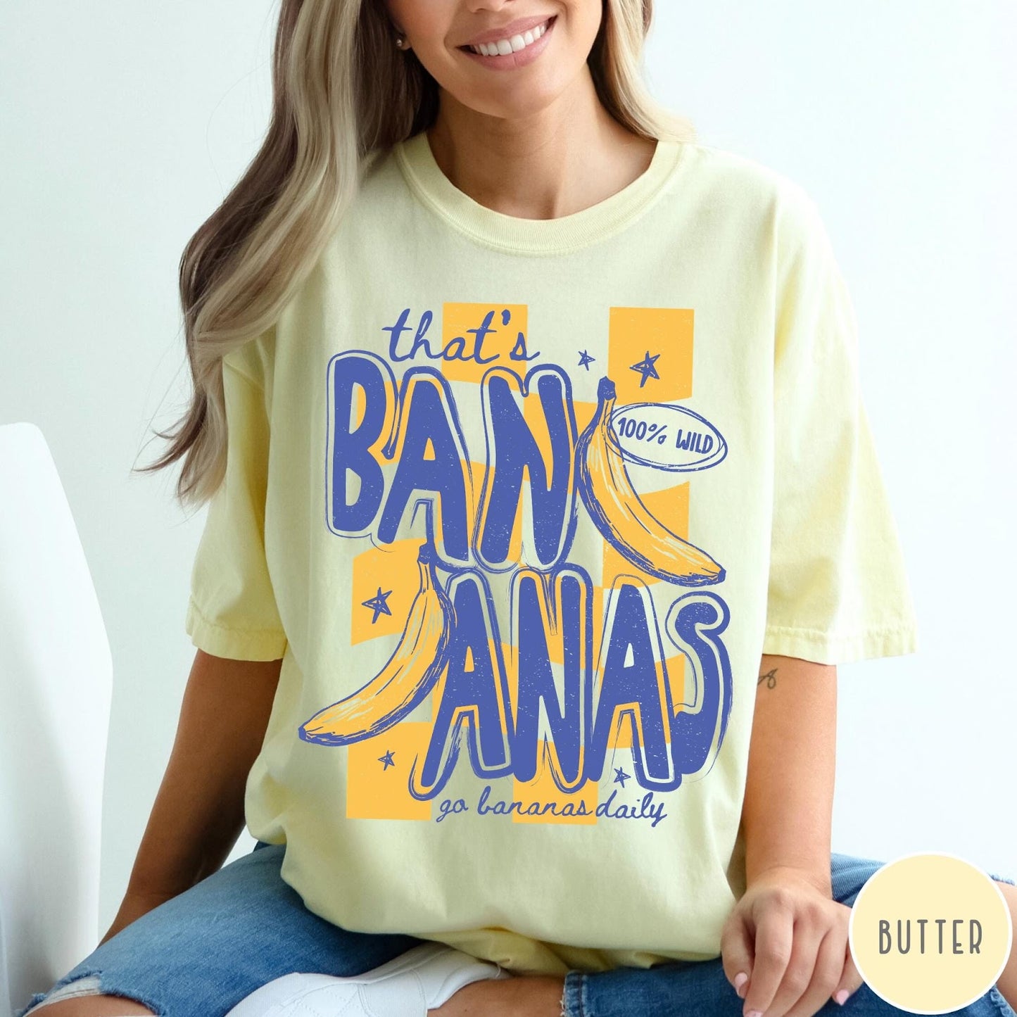 Comfort Colors tee in Butter featuring retro style graphic with bananas and text that says that's bananas
