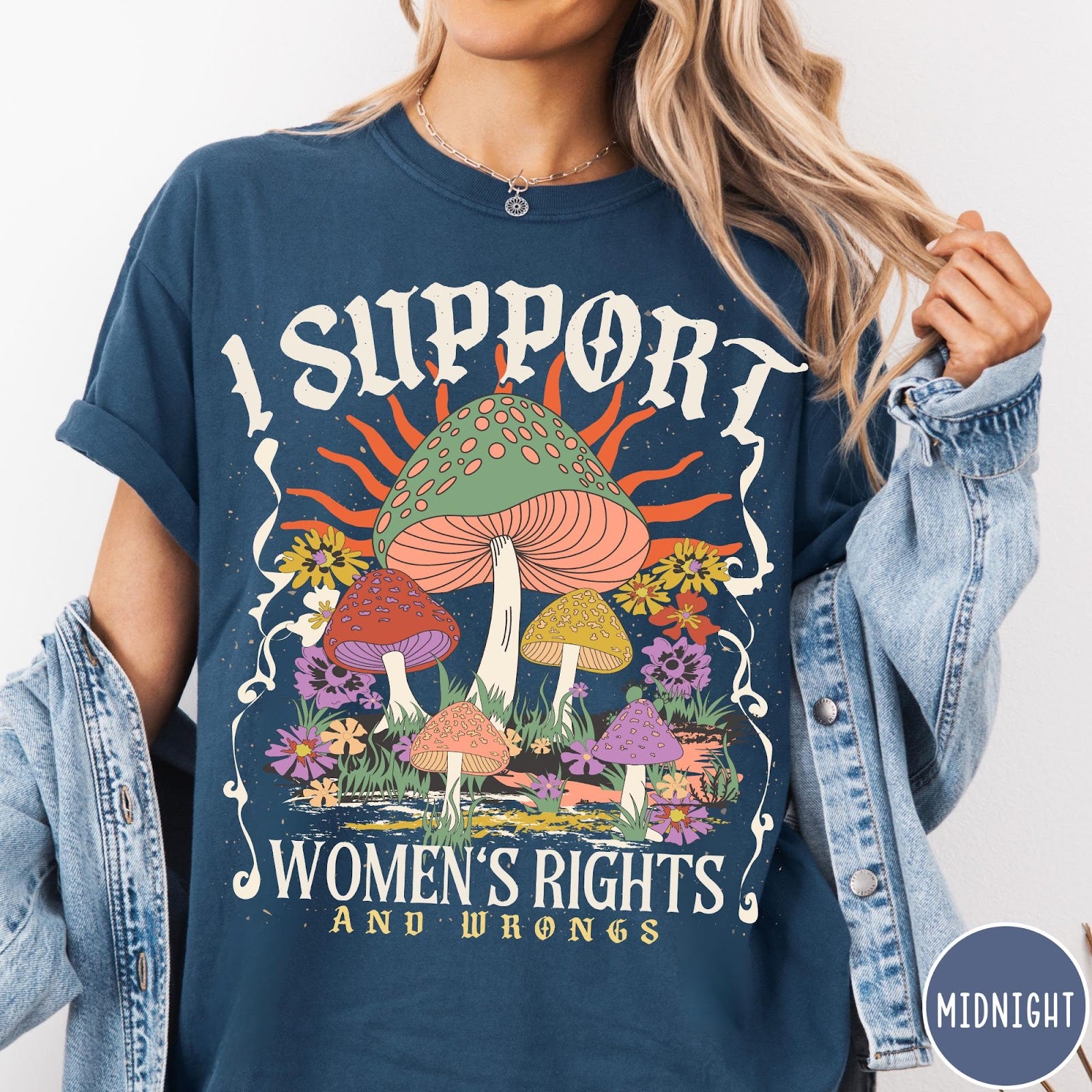 Comfort Colors tee in Midnight featuring retro style graphic with mushrooms, flowers, and sun with inspirational text