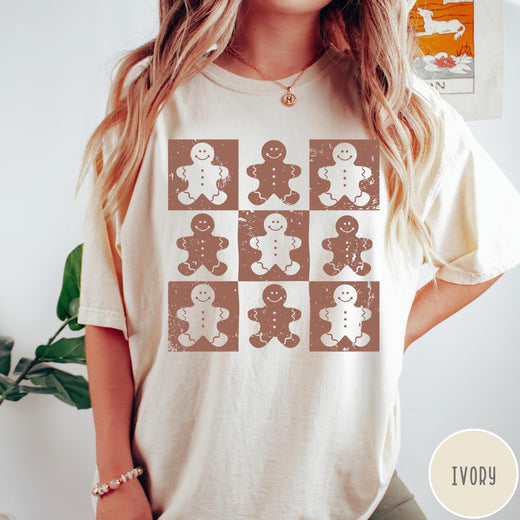 Comfort Colors tee in Ivory featuring a grid pattern design with nine distressed brown and white gingerbread cookies