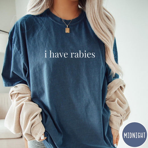 Comfort Colors tee in Midnight featuring sarcastic statement graphic text that reads i have rabies
