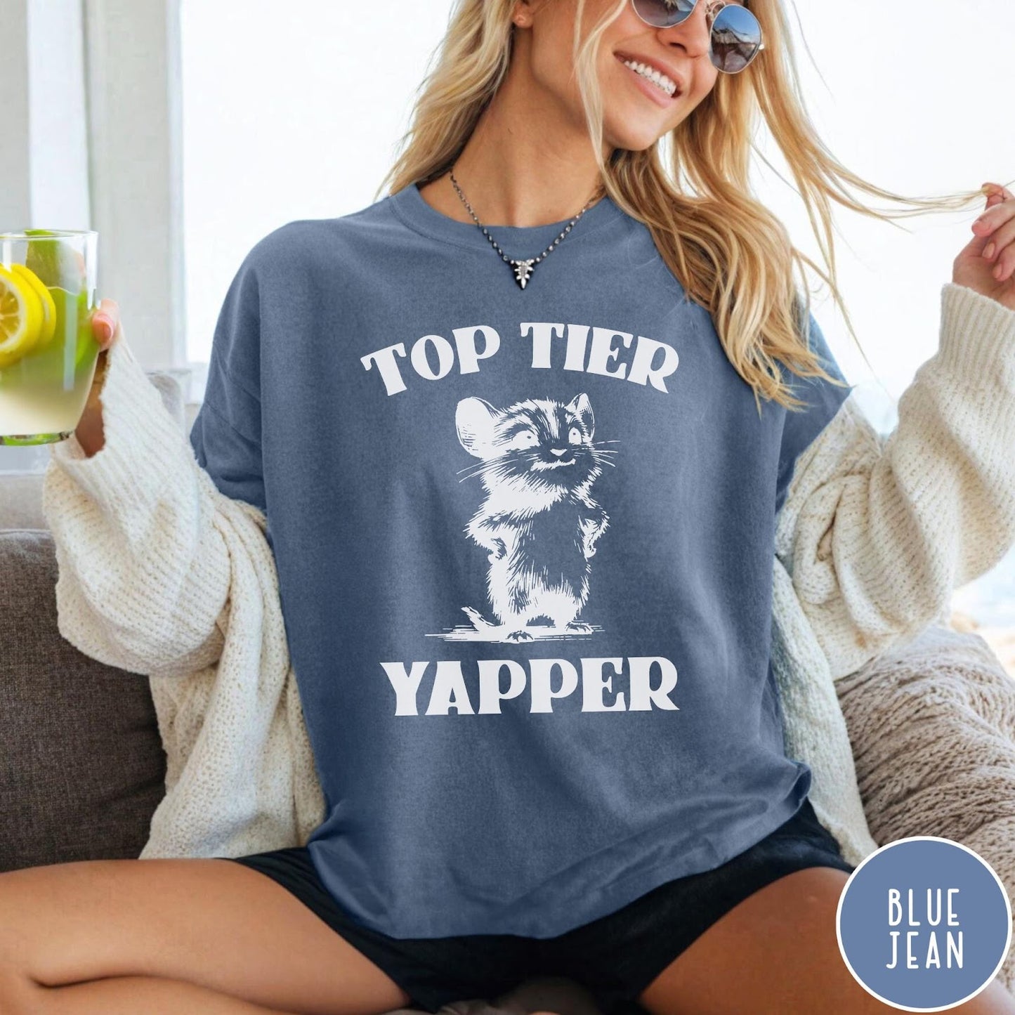Comfort Colors tee in Blue Jean featuring graphic design of a chattering animal with Top Tier Yapper text