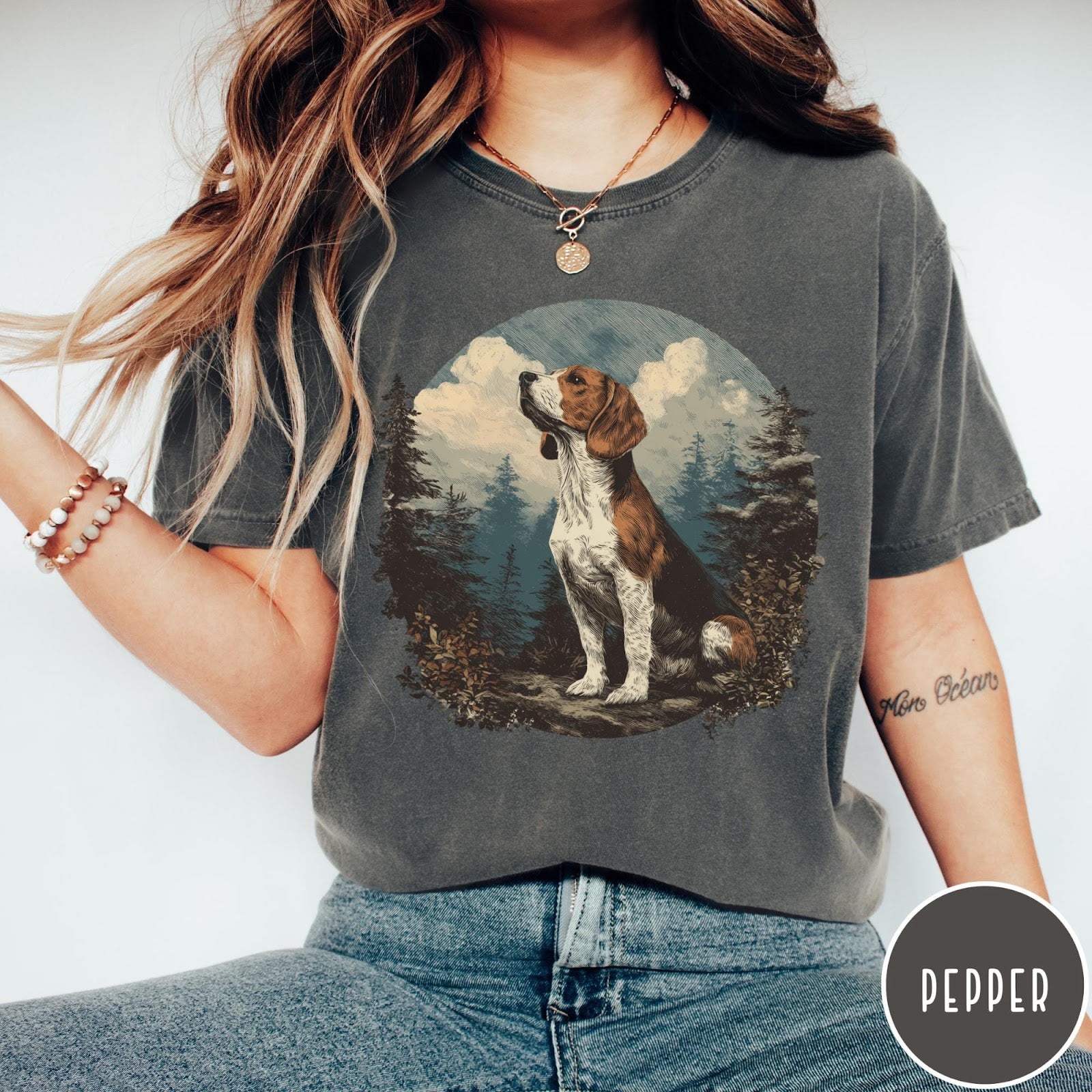 Comfort Colors tee in Pepper featuring vintage style graphic of a beagle sitting in a forest scene