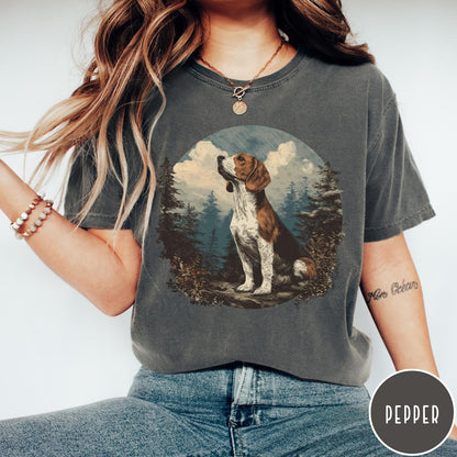 Comfort Colors tee in Pepper featuring vintage style graphic of a beagle sitting in a forest scene