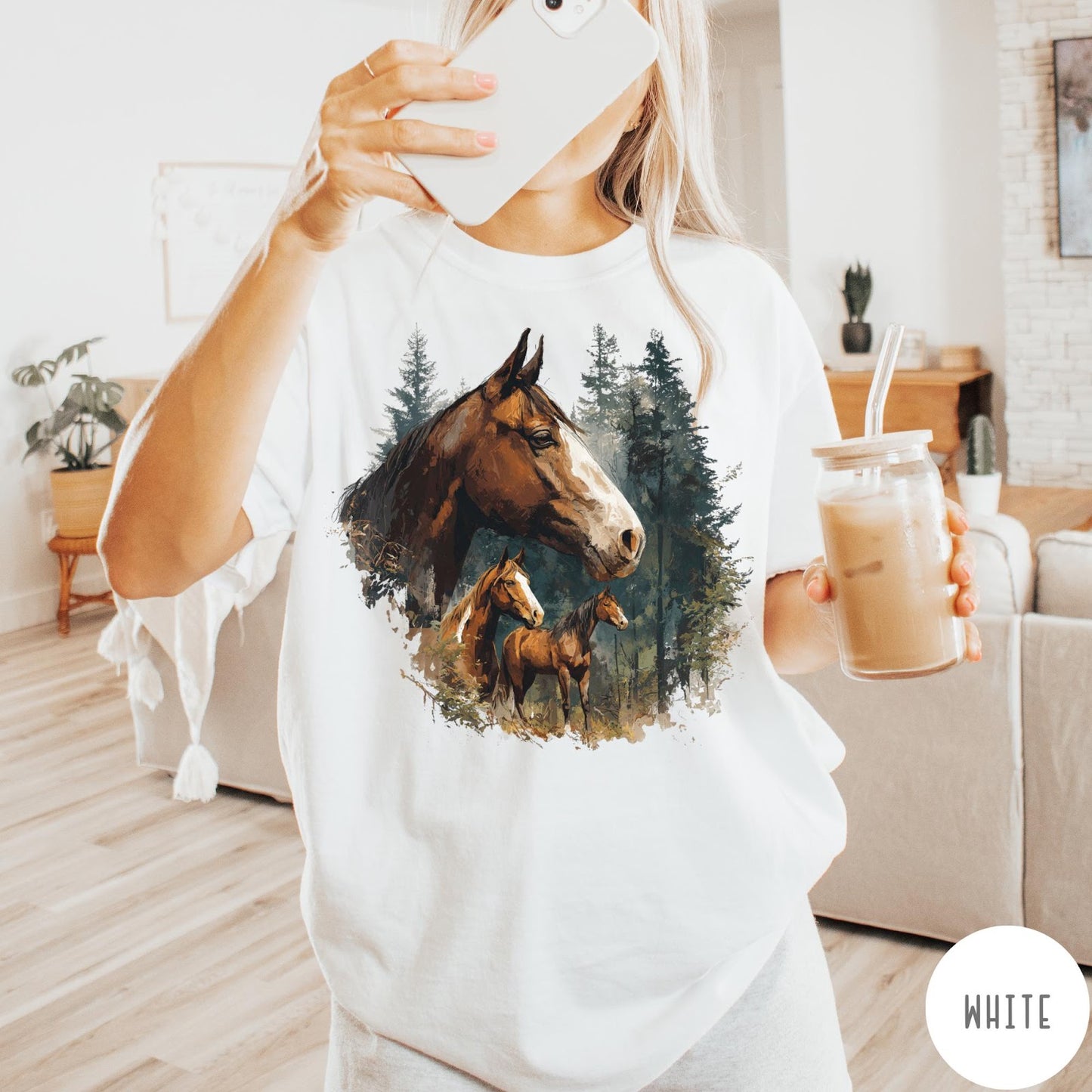 Comfort Colors tee in White featuring vintage style graphic of three horses standing in a pine forest
