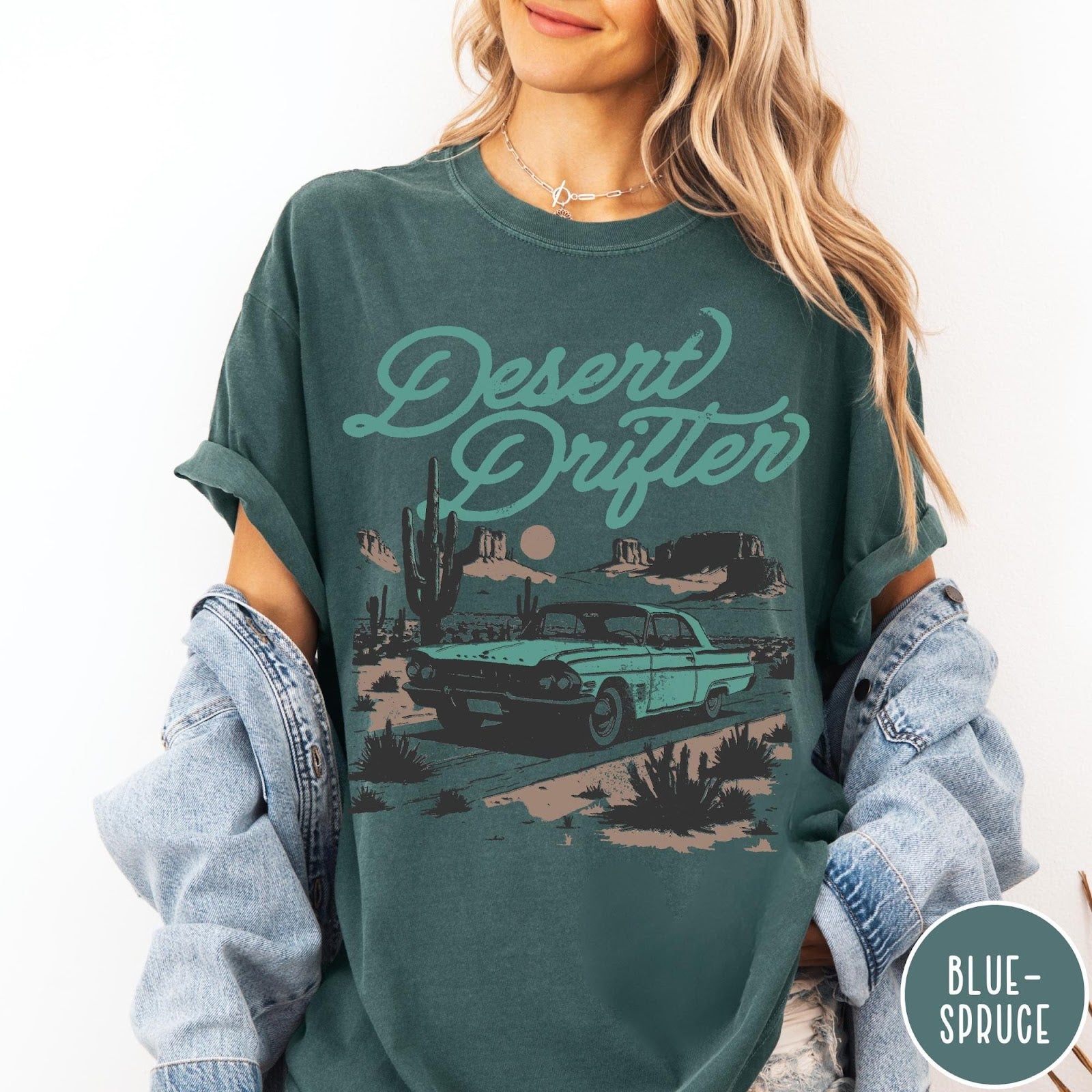 Comfort Colors tee in Blue Spruce featuring vintage style graphic of a classic car in a desert landscape